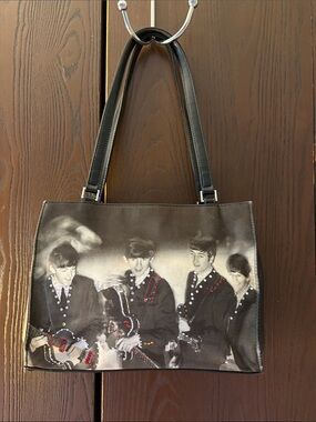 No brand black graphic  handbag of the Beatles with Stud Embellishment.